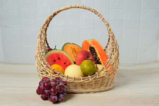 Assorted fresh fruit in basket. Summer fruit set