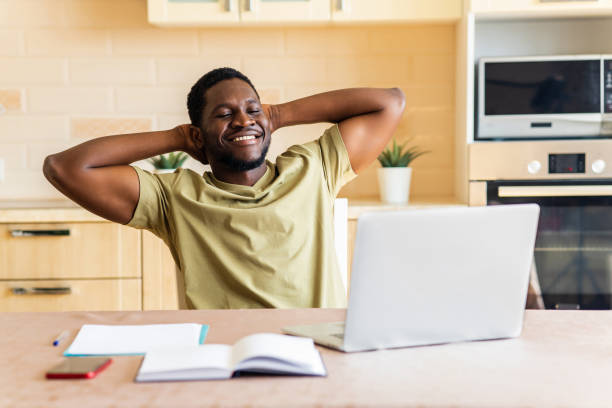 istock latin hispanic man freelancer using laptop studying online working from home 1435069421