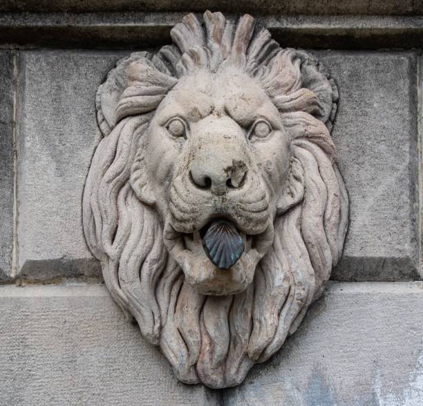 istock Stone sculpture of medieval lion head 1435070158