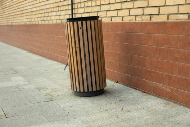 istock Garbage can on street. Waste tank. Garbage in city. 1435070311