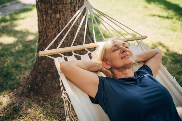 Woman sleeping in hammock