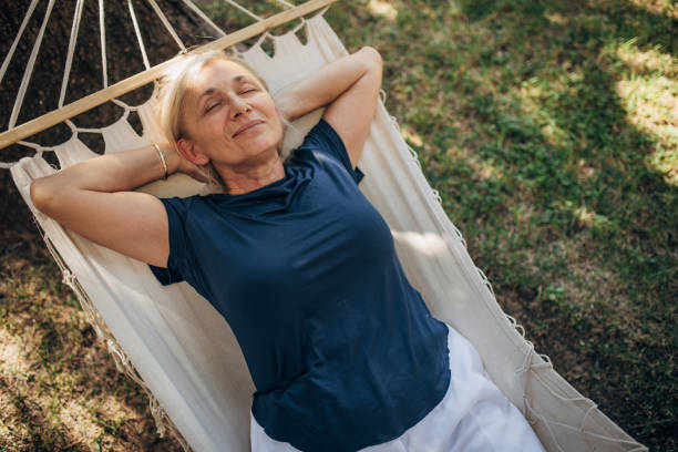 istock Woman sleeping in hammock 1435078225