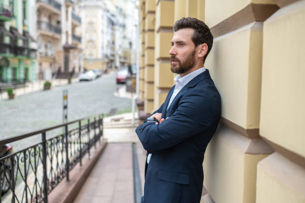 istock Young good-looking elegant man on the urban background 1435078656