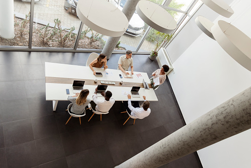 High angle shot of a group of businesspeople having a meeting