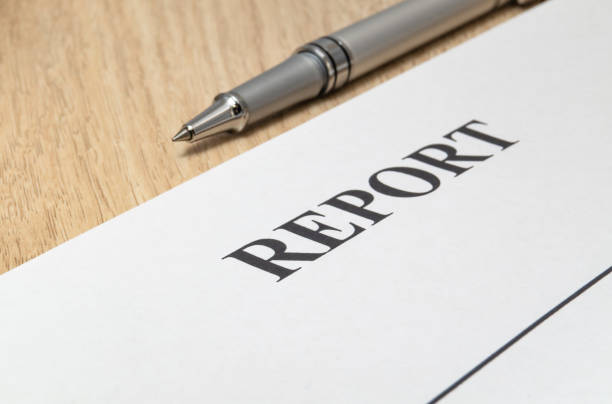 istock Report with pen on table - preparation for records. 1435080072