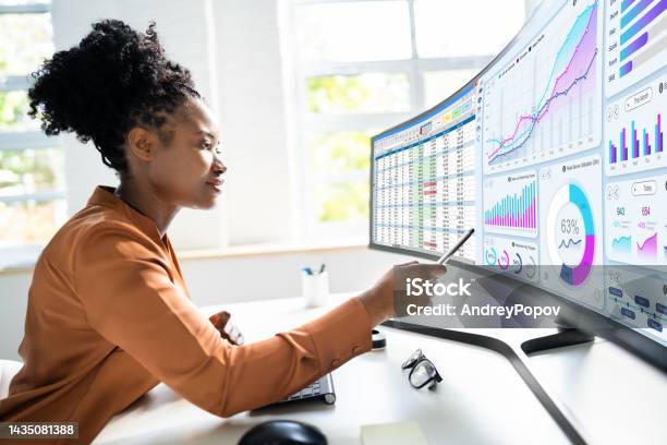 Analyst Woman Looking Stock Photo - Download Image Now - Big Data, Analyzing, Data