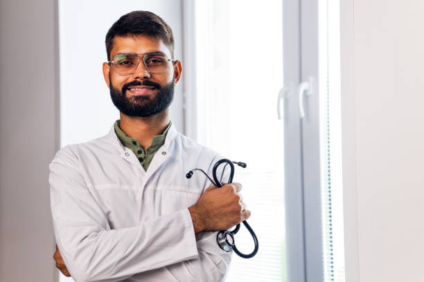 istock indian pet doctor wearing uniform and holding a stethoscope 1435081709
