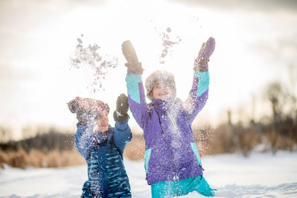 istock Children Having a Snow Fight 1435081892