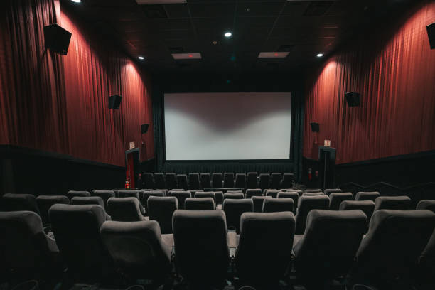 Movie Theater grey seats in a modern cinema stock photo
