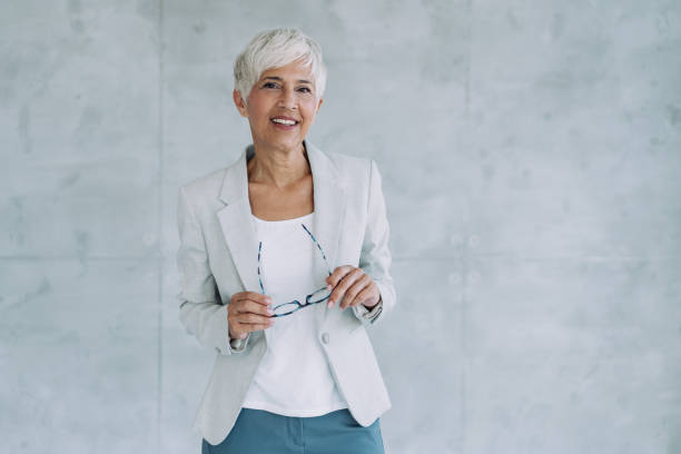 istock Confident businesswoman in modern office. 1435089718