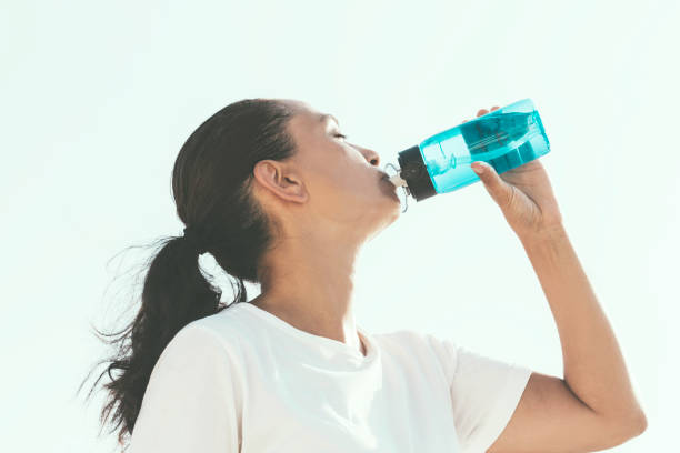 istock Woman Drinking Water 1435090519