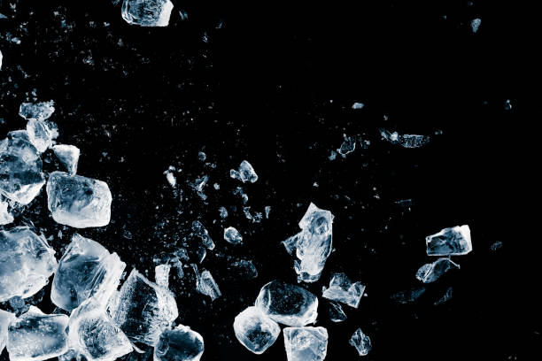 istock Ice cubes crush on black background. Chill backdrop. 1435091066