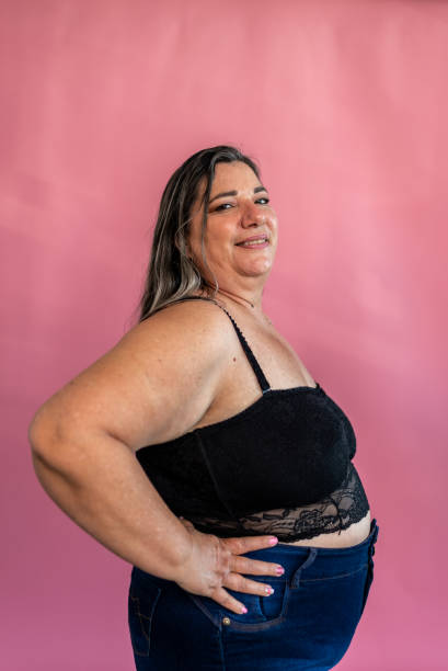 istock Mature woman on a pink background 1435091248
