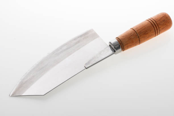istock Wooden silver knife isolated on white background. Studio shot. 1435091410
