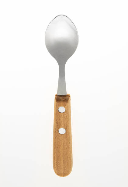 istock Wooden silver spoon isolated on white background. 1435091417