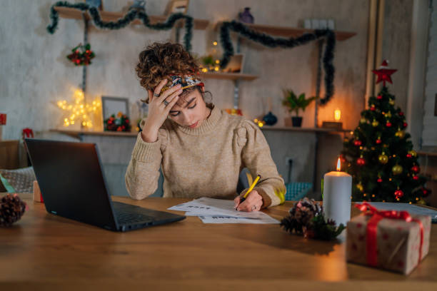 istock Worried woman going through her financials 1435091675