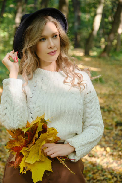 istock happy autumn woman 1435093469