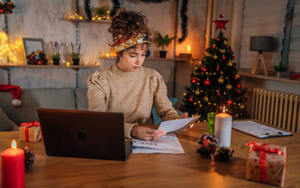 istock Woman managing finances in the evening 1435093527