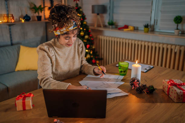 istock Woman doing finances at home 1435093624