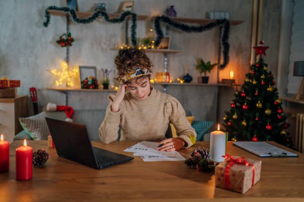 istock Worried woman going through her financials 1435094309