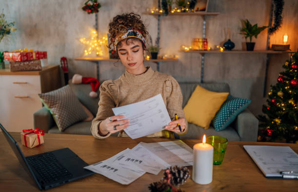 istock Woman managing finances in the evening 1435094551