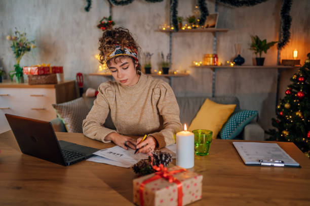 istock Woman doing finances at home 1435094647