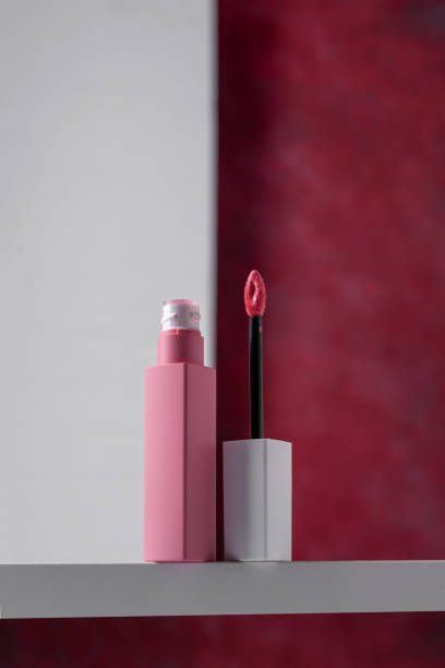 istock Liquid lipgloss applicator and tube, beauty make up product. 1435095019