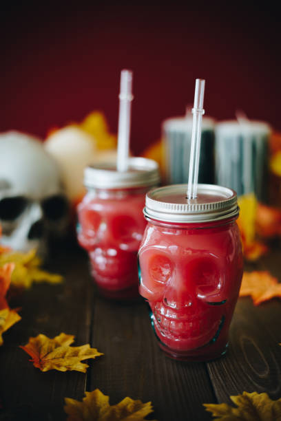 istock Halloween cocktails in skull glasses 1435097456
