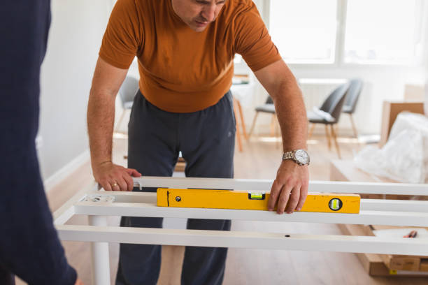 istock Man working with spirit level at home 1435099415