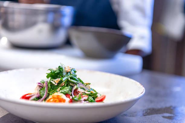 istock There is a salad on the plate made by a chef on the table 1435101080