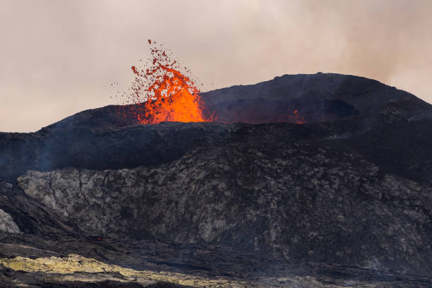 istock Impressive aerial view of the exploding red lava from the Active Volcano in Iceland 1435104311