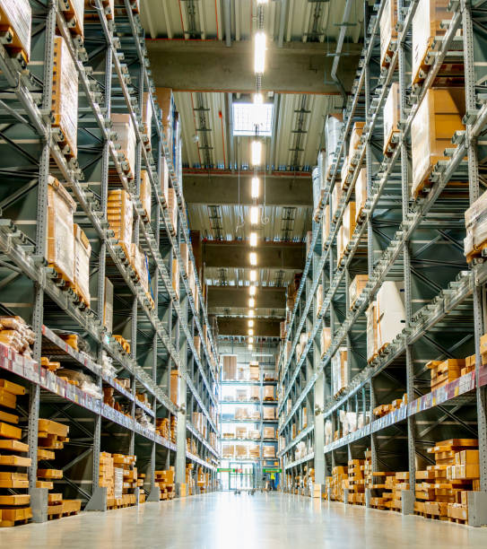 istock High racks in the aisle in a large warehouse vertical view 1435105348
