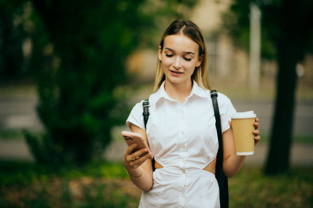 istock teenager girl using smart phone 1435107571