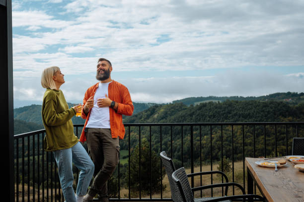 istock Cheerful couple enjoying weekend in mountains. 1435109031