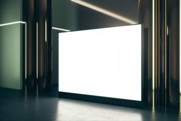 istock Perspective view on blank white illuminated screen with place for your logo or text between golden pillars in dark empty room with glossy floor and green wall. 3D rendering, mock up 1435109033