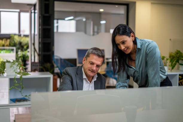 istock Co-workers seek solutions for their company's finances 1435117955