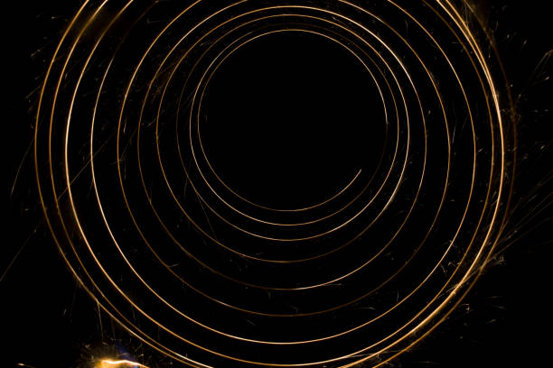 istock Sparks from the circular rotation of lights on a black background 1435118768