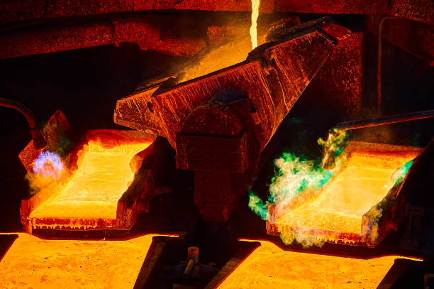 istock Pouring molten copper for anodes into form on casting wheel 1435119568