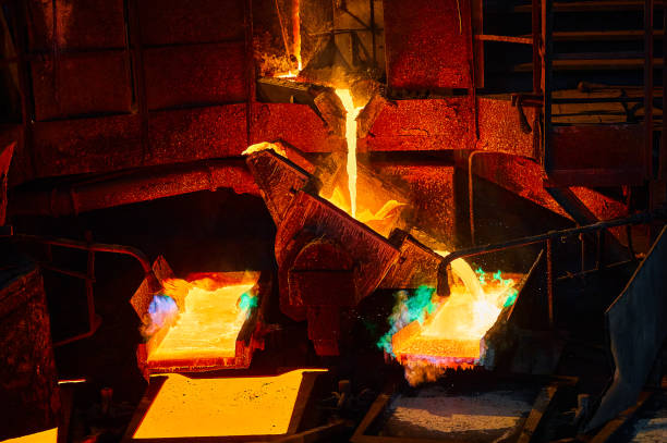 istock Pouring molten copper for anodes into form on casting wheel 1435119573