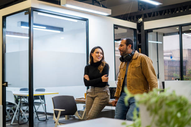 istock Coworkers are talking about work in the office 1435119984
