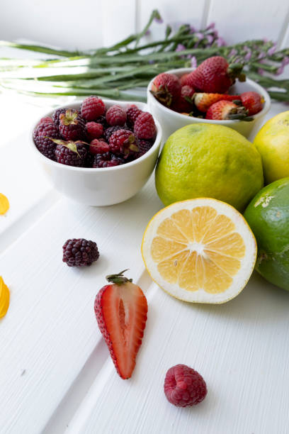 istock lemon, strawberries and blackberries as wallpaper, citrus fruit with vitamin c 1435123423