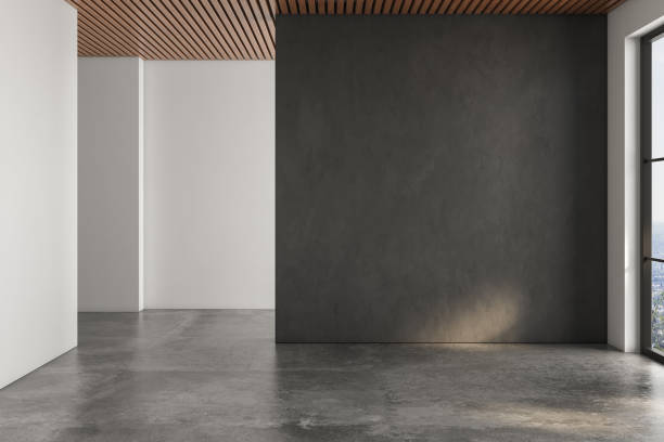 istock Realistic 3D rendering of empty room, beautiful sunlight and window frame shadow on black blank wall, white wall. concrete floor, wooden ceiling. Background, Interior. Front view.Mock up. 1435126466
