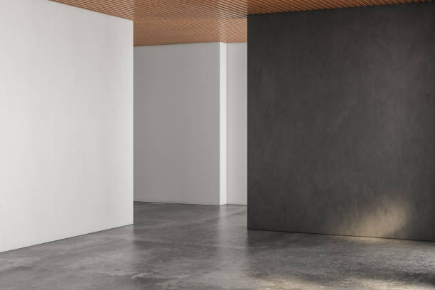 istock Realistic 3D rendering of empty room, beautiful sunlight and window frame shadow on black blank wall, white wall. concrete floor, wooden ceiling. Background, Interior. Front view.Mock up. 1435126823