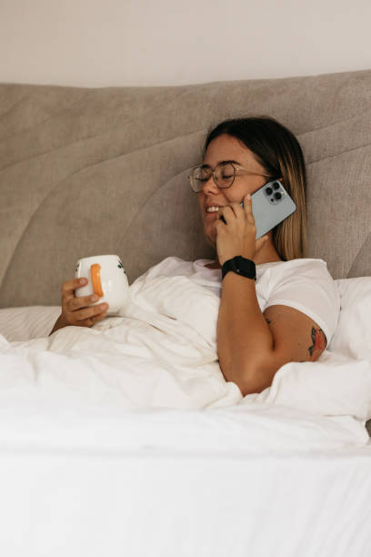 istock Early morning phone call from bed 1435130665