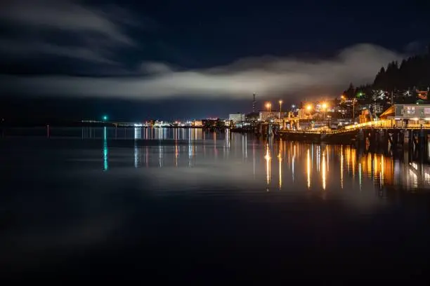 Photo of Illuminated lights of downtown Ketchikan near the water in Alaska