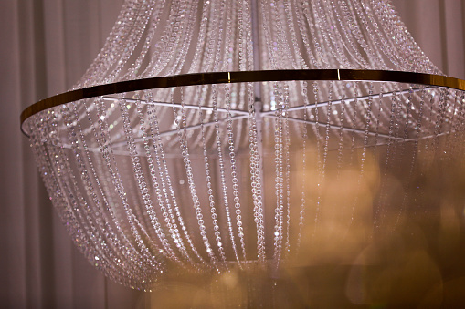 wedding decor beautiful crystal chandelier close up.