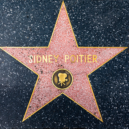 Los Angeles, USA - March 5, 2019:  closeup of Star on the Hollywood Walk of Fame for Sidney Poitier.