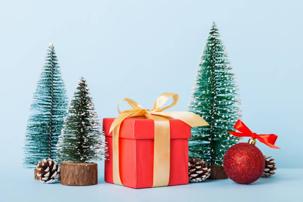 istock Christmas composition. craft Gift box, small tree, branches and craft DIY decorations on white background. New year concept. Christmas home decoration Flat lay, top view, copy space 1435138170