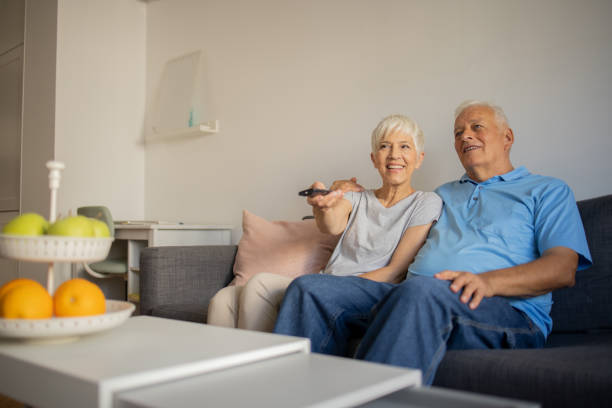 istock Senior couple watching TV 1435149333
