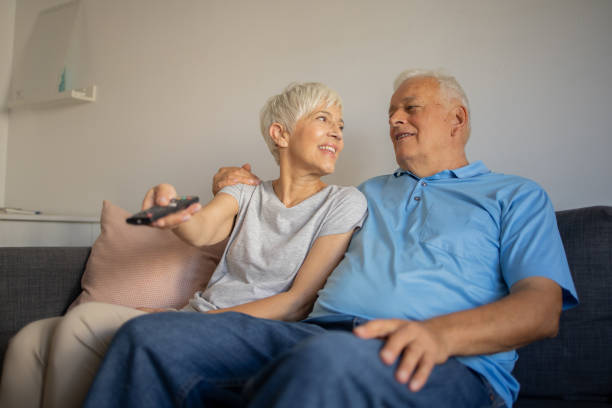 istock Senior couple watching TV 1435149334